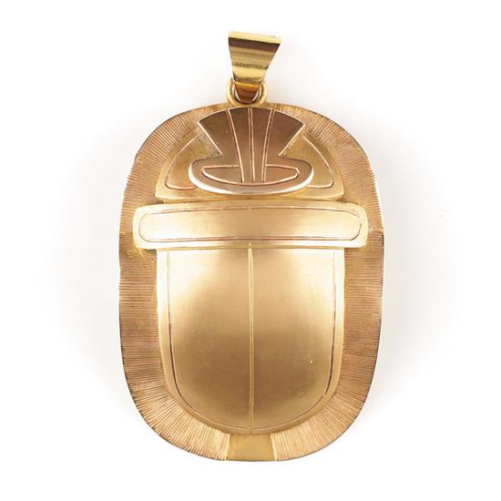 Appraisal: Egyptian gold scarab pendant K gold beetle and underside with