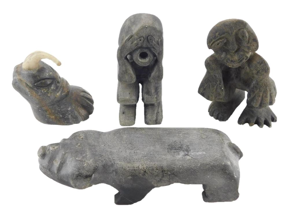 Appraisal: TRIBAL Four small Inuit carved stone sculptures figures and beasts