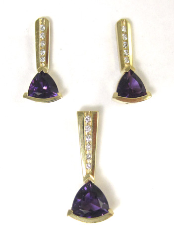 Appraisal: THREE PIECE AMETHYST JEWELRY SET including a k yellow gold