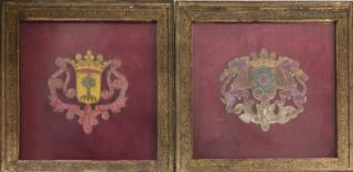 Appraisal: Pair of Framed Armorial Emblems Silk wool stitched armorial emblems