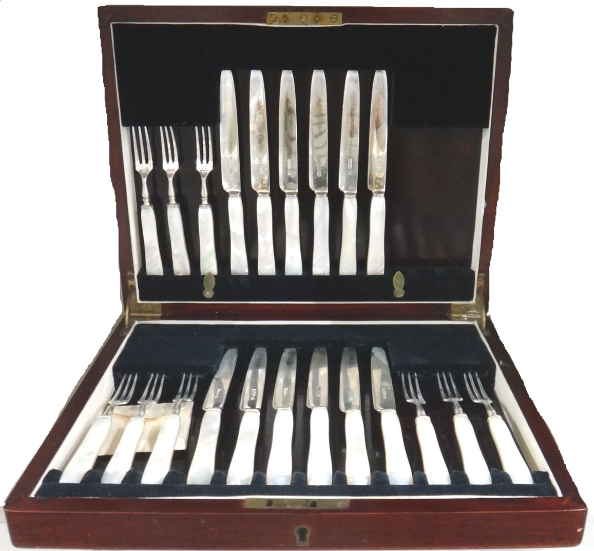 Appraisal: Twelve silver bladed dessert knives and nine silver pronged dessert