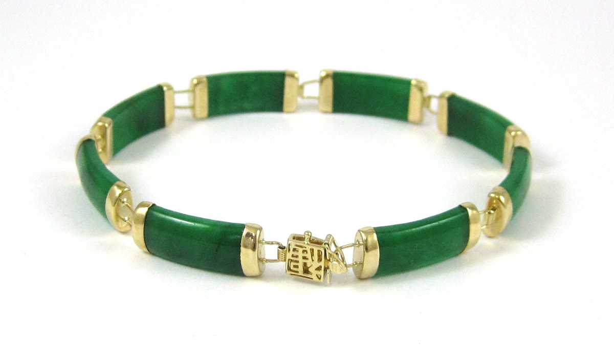 Appraisal: JADE AND FOURTEEN KARAT GOLD BRACELET measuring - inches in