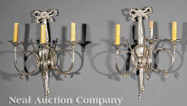 Appraisal: A Pair of Louis XVI-Style Silvered Bronze and Brass Three-Light