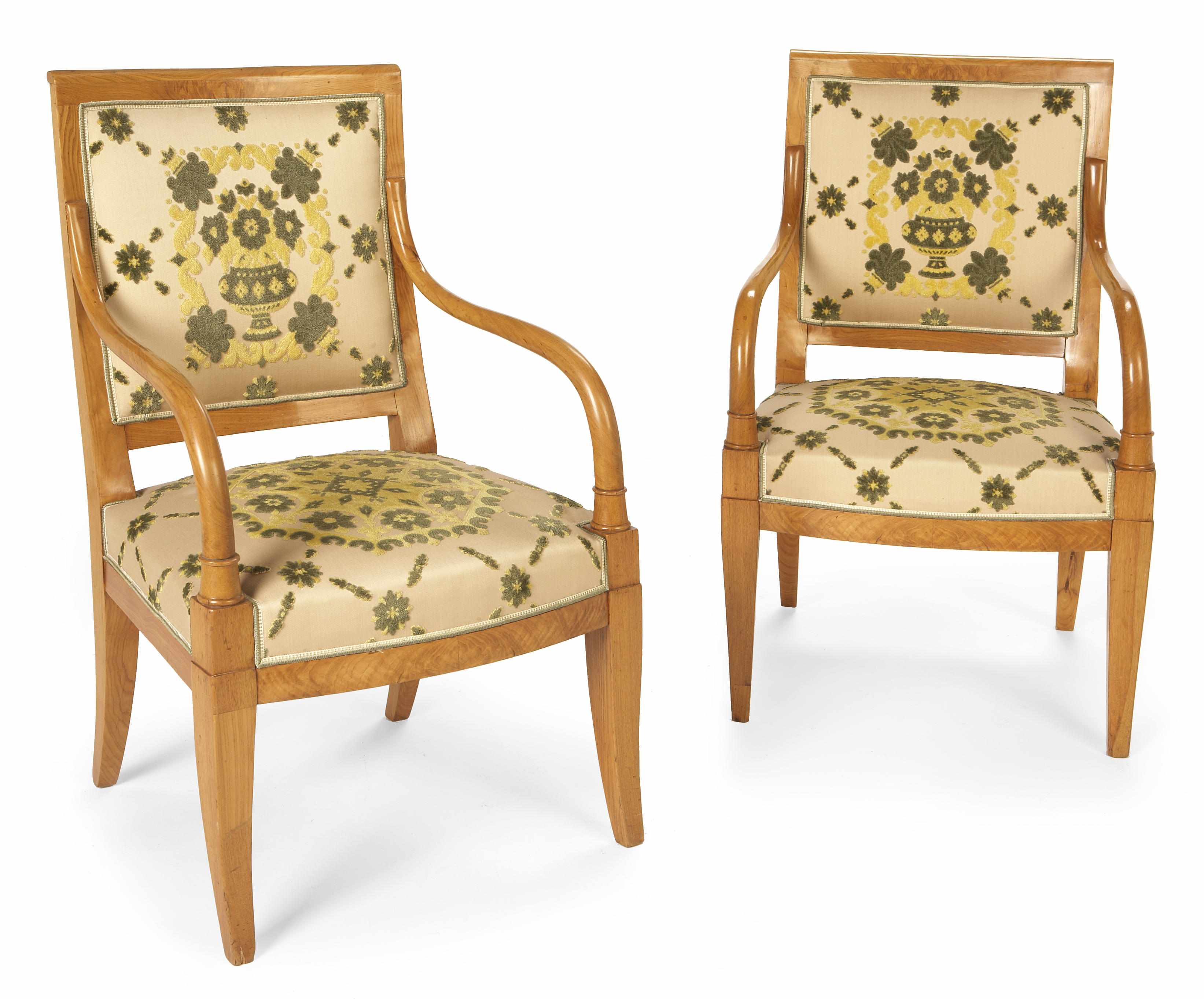 Appraisal: A pair of Biedermeier style birch open armchairs height in