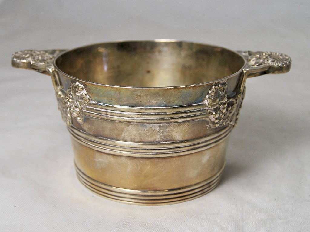 Appraisal: A silver Georgian style wine cup having cast handles and