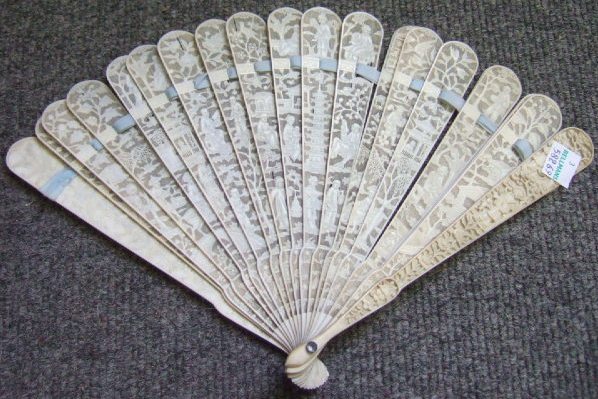 Appraisal: A Chinese ivory fan th century with carved and pierced