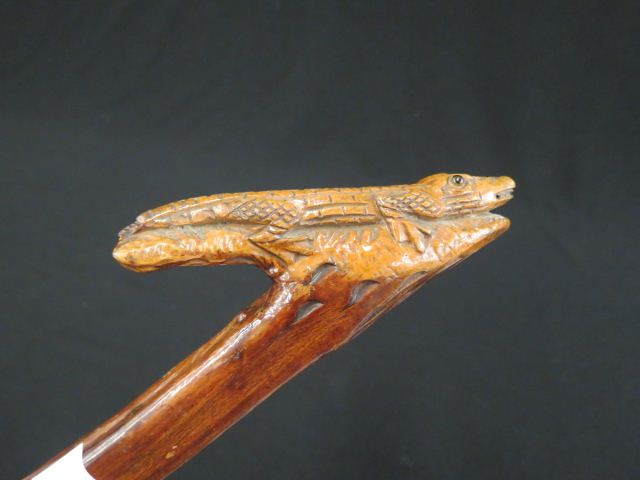 Appraisal: Folk Art CArved Aligator Cane elaborate handle natural shaft long