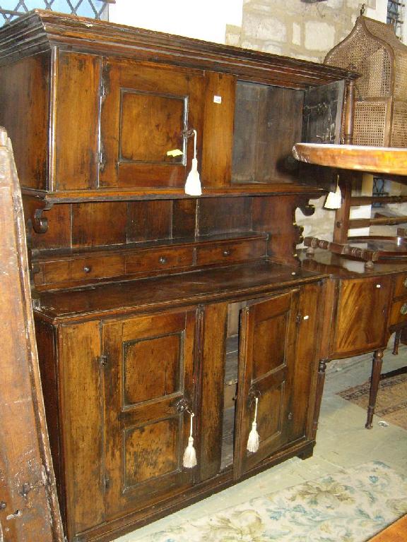 Appraisal: An th century continental walnut kitchen dresser the lower section