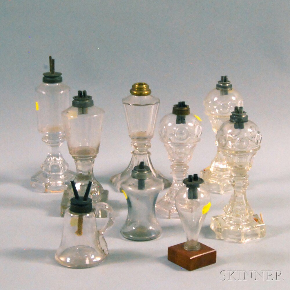 Appraisal: Nine Colorless Blown and Pressed Glass Fluid Burning Lamps including