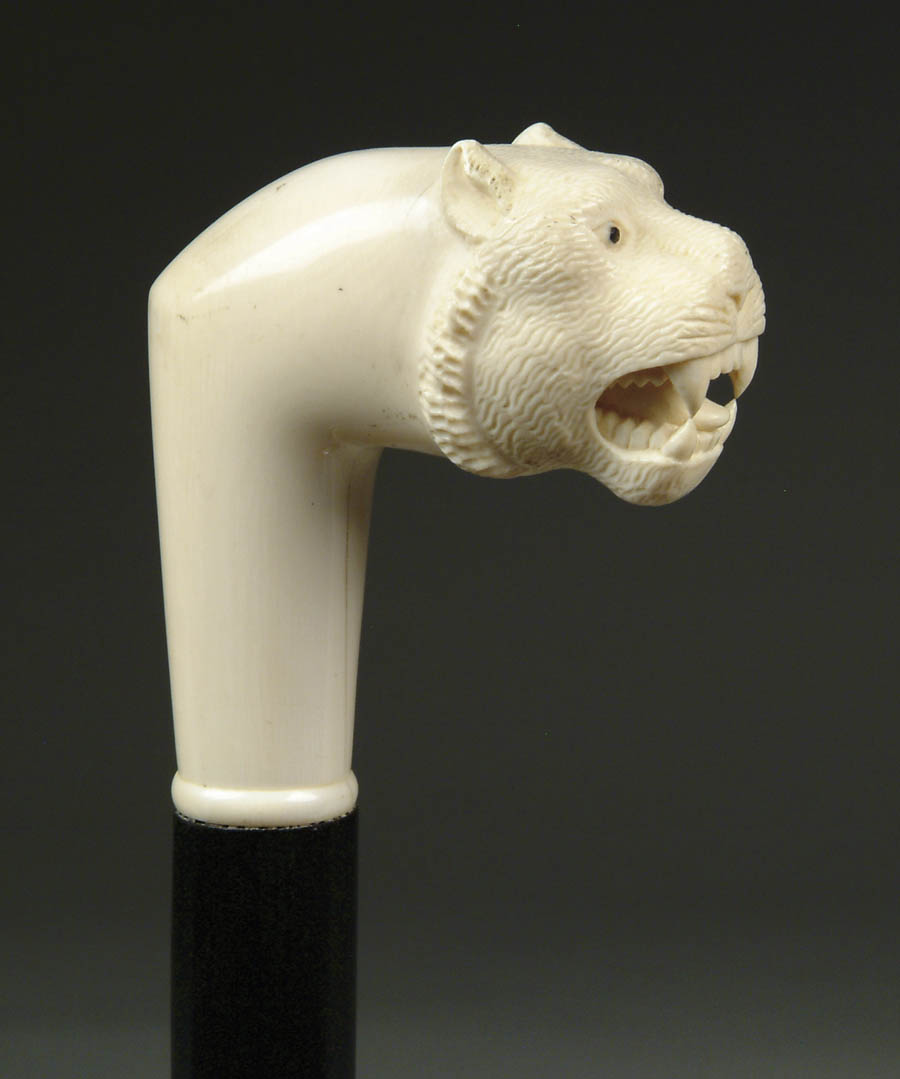 Appraisal: LARGE ANGLO-INDIAN CARVED ELEPHANT IVORY LION CANE Handle depicts a