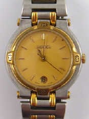 Appraisal: A bi colour metal lady's wrist watch dial and case