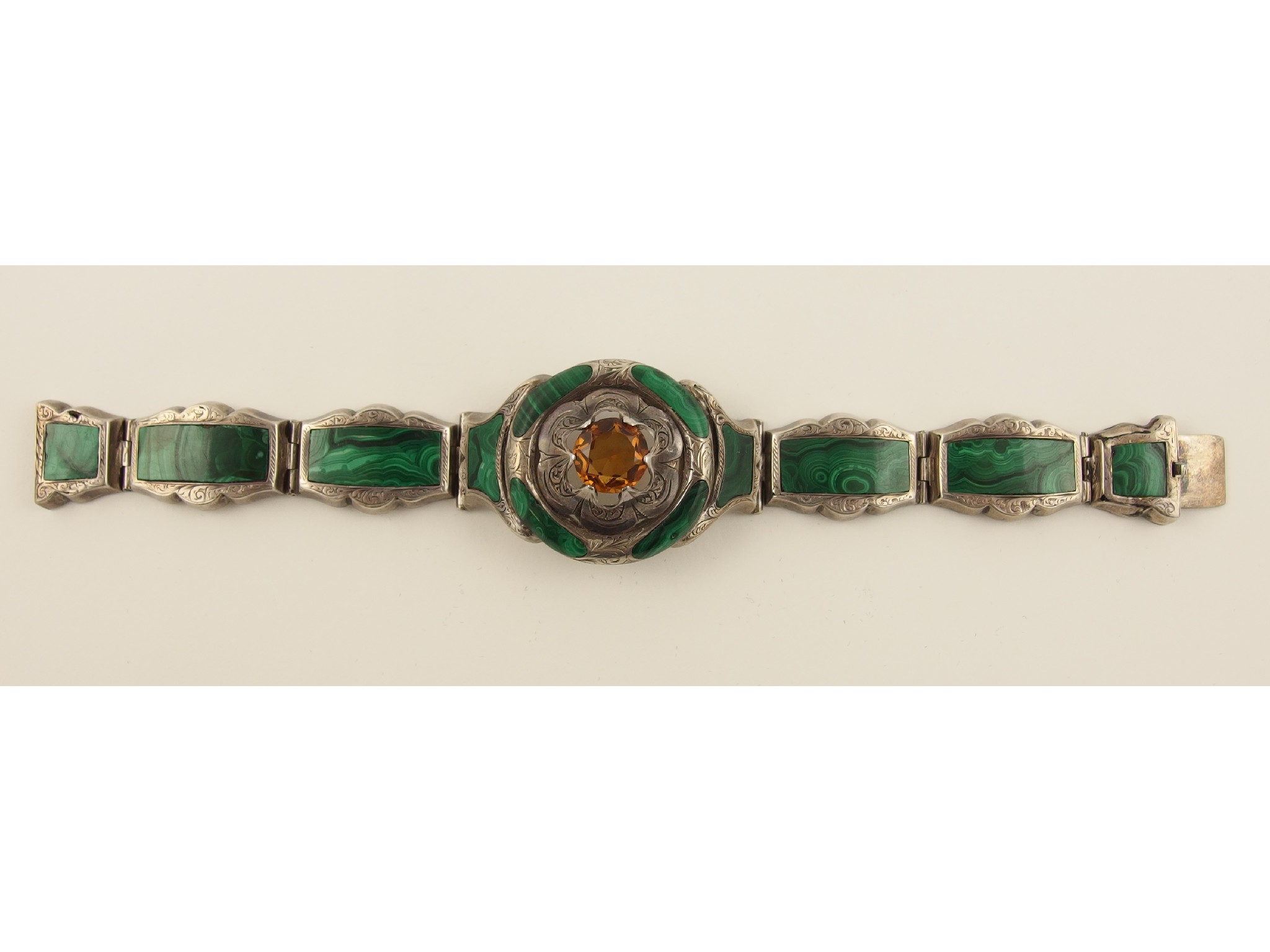 Appraisal: A Malachite braceletin the Scottish style set within the engraved