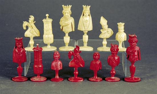 Appraisal: Carved bone chess pieces one set in natural coloration other