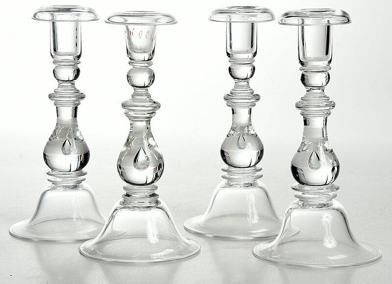 Appraisal: Four Steuben Clear Glass Candlesticks American th century large bell