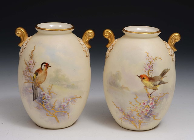 Appraisal: A pair of Royal Worcester and Grainger Co two handled