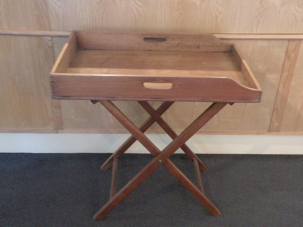 Appraisal: A Victorian mahogany butlers tray and stand cm wide