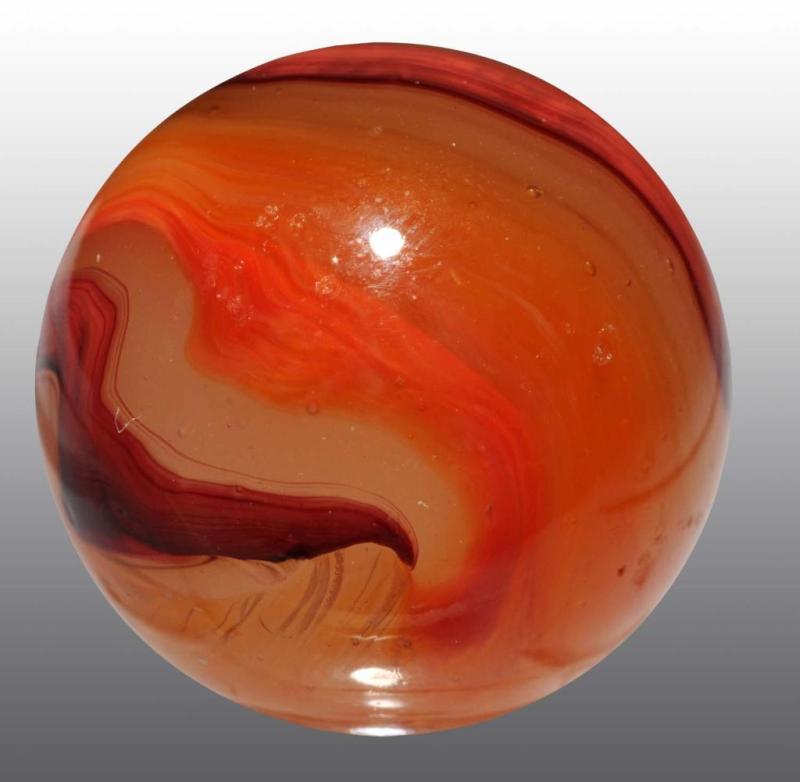 Appraisal: Akro Carnelian Oxblood Marble Description Some swirls of orange slight