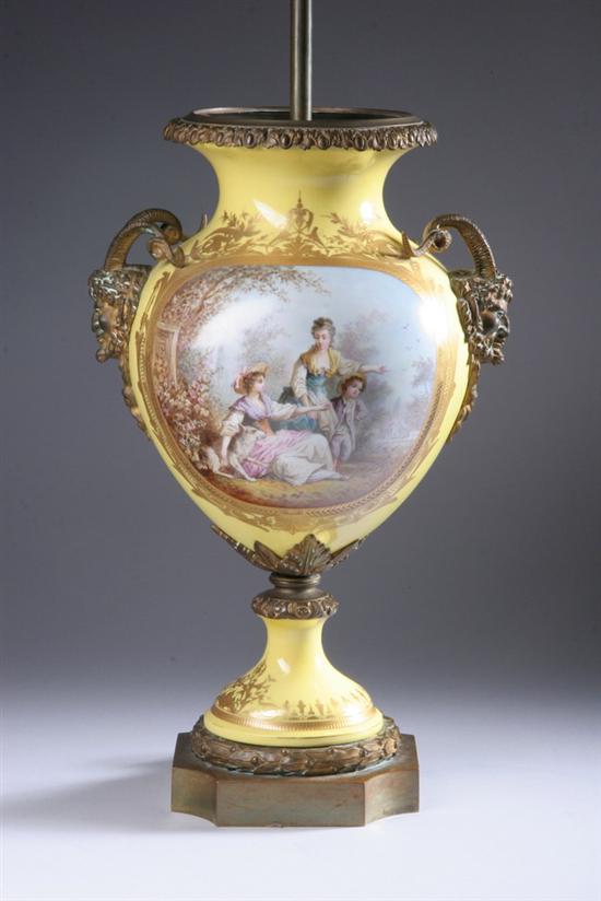 Appraisal: ORMOLU-MOUNTED S VRES-STYLE PORCELAIN URN th century Yellow ground one