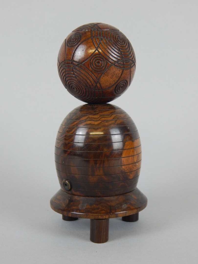 Appraisal: Two items of treen a thC hardwood stylised bowling ball