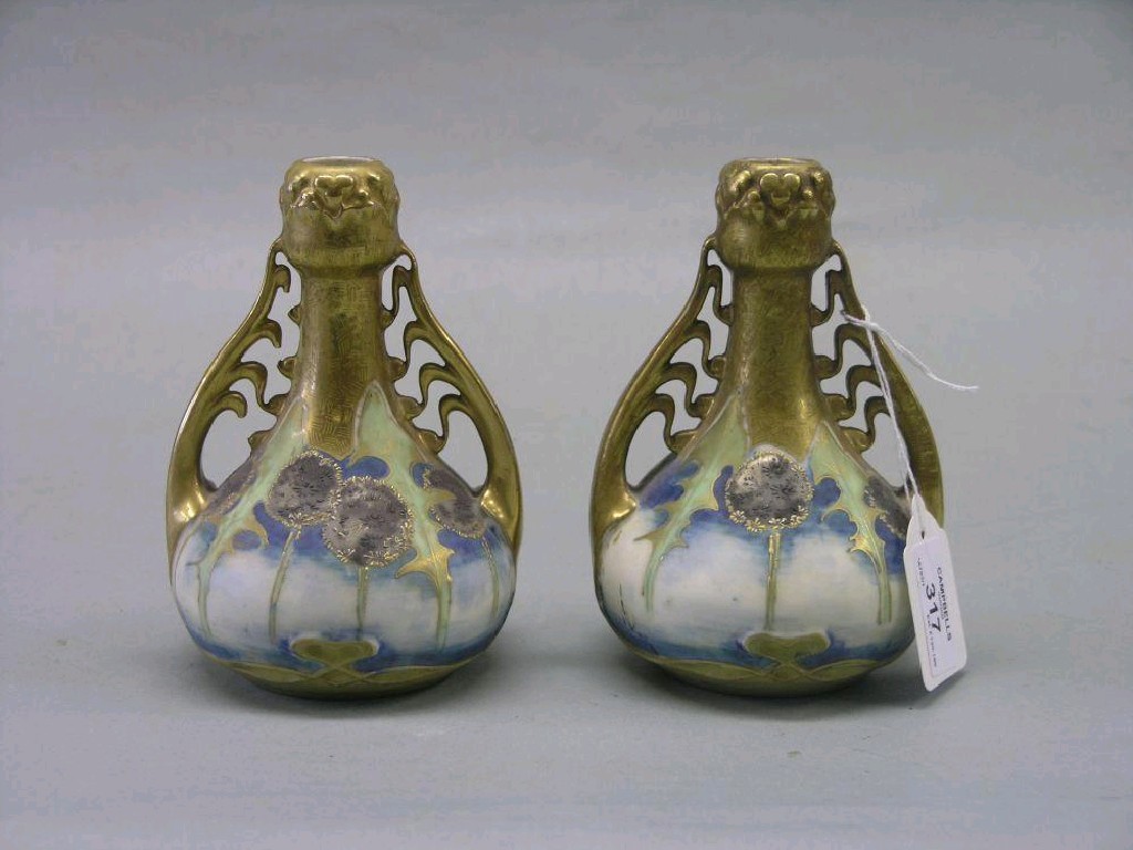 Appraisal: A pair of Reissner Stellmacher Kessel vases Art Nouveau form