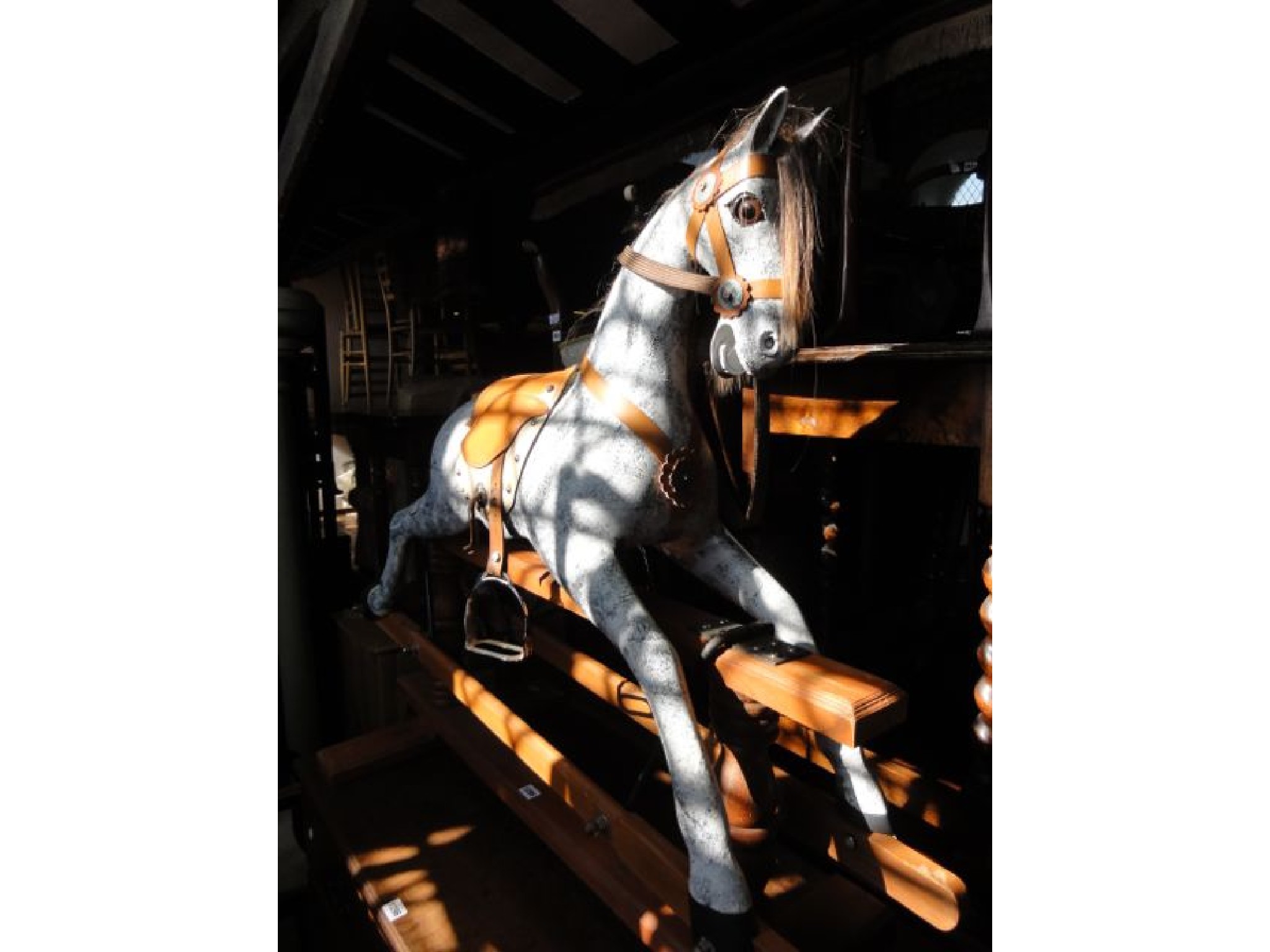 Appraisal: A Victorian style wooden rocking horse with dappled painted finish