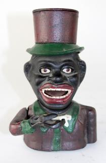 Appraisal: Black Americana painted cast iron bank Black Americana painted cast