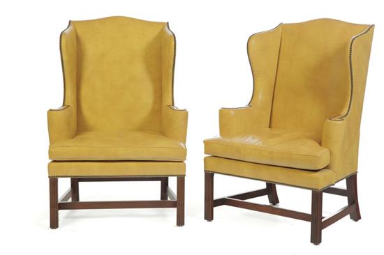 Appraisal: PAIR OF CHIPPENDALE-STYLE EASY OR WING CHAIRS Kittinger New York