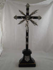 Appraisal: An Italian hallmarked silver and ebony crucifix on stand approx