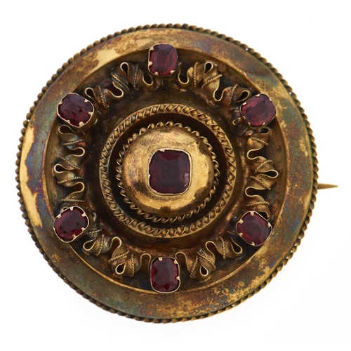 Appraisal: A Victorian garnet brooch c in gold locket back g