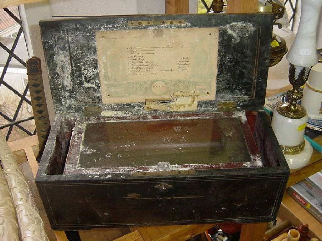 Appraisal: The remains of a th century musical box by Nicole