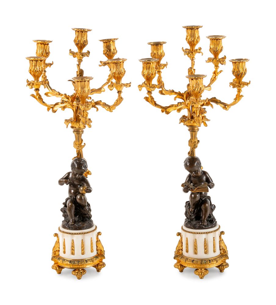 Appraisal: A Pair of Louis XVI Style Gilt and Patinated Bronze