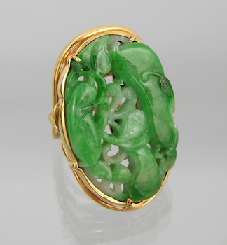 Appraisal: A Fine High Karat and Carved Jadeite Ring by Dominick