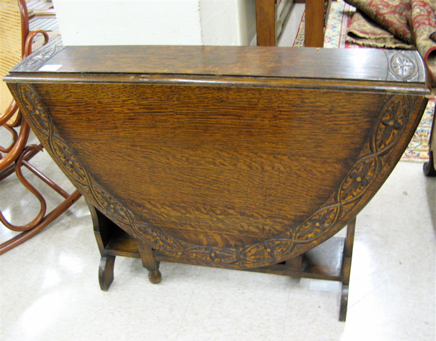 Appraisal: CARVED OAK DROP-LEAF DINING TABLE th century style English early