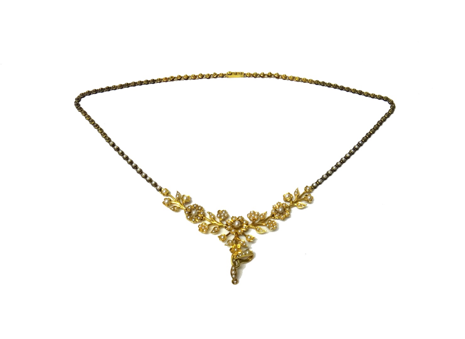 Appraisal: A gold and seed pearl set necklace the front in