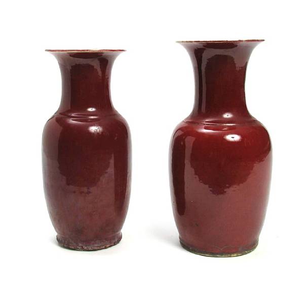 Appraisal: A pair of Chinese ox blood colored vases height in