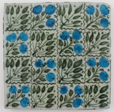 Appraisal: A William De Morgan tile painted with panels of berries