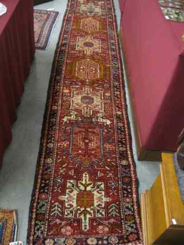 Appraisal: Heriz Persian Handmade Runner geometric designs floral border ' ''