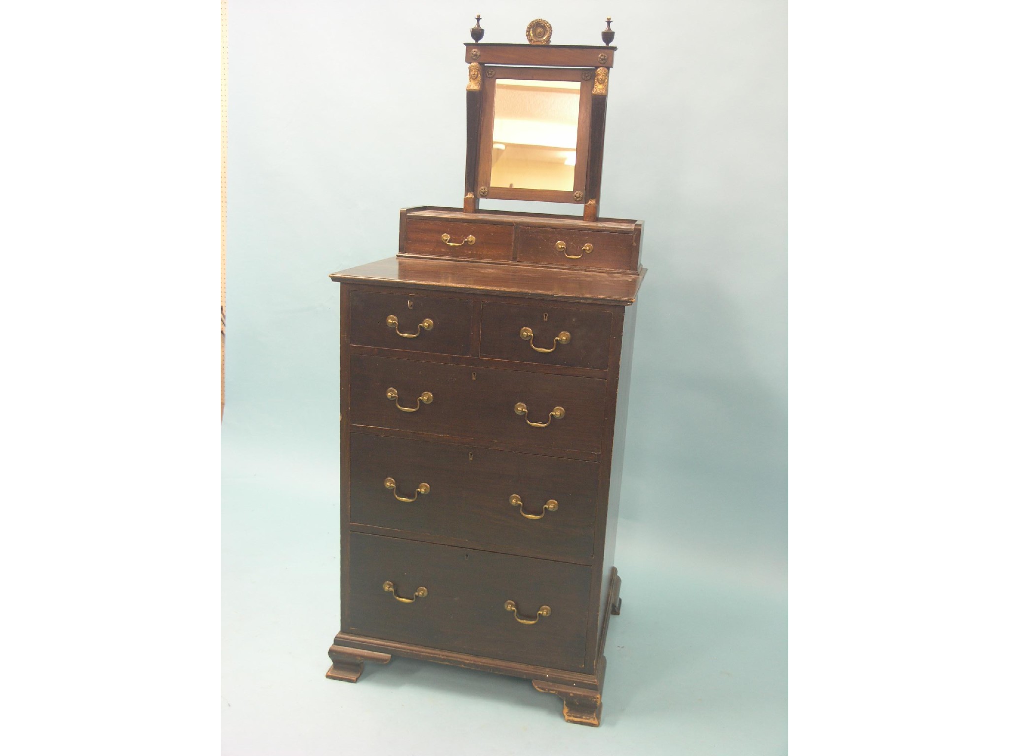 Appraisal: An early th century mahogany dressing chest top mounted with