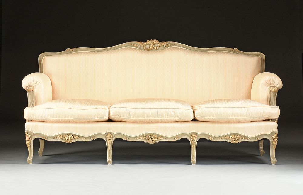 Appraisal: A LOUIS XV STYLE PARCEL GILT AND PAINTED WOOD SETEE