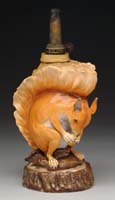 Appraisal: PORCELAIN FIGURAL LAMP BASE H - Squirrel sitting on a