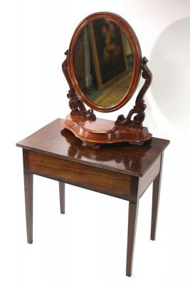 Appraisal: A mahogany table with hinged lid cm wide and an