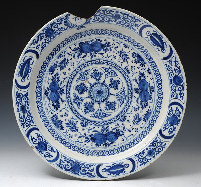 Appraisal: A LARGE DELFTWARE BLUE AND WHITE CHARGER dated and with