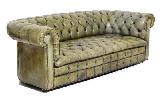 Appraisal: CHESTERFIELD SOFA England th c Green leather Brass casters L