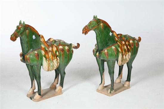 Appraisal: PAIR OF TANG-STYLE HORSES China th century pottery Sancai glazed