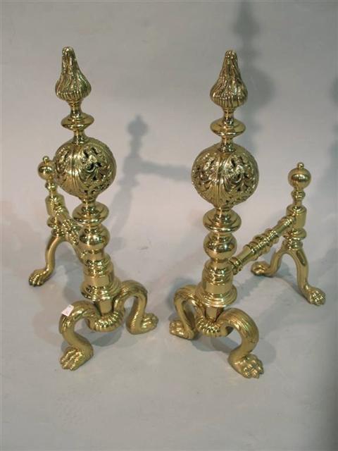 Appraisal: PAIR OF BRASS ANDIRONS With flame finials foliate pierced ball