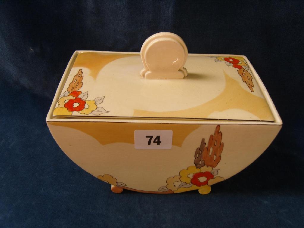 Appraisal: A Clarice Cliff Bizarre box and cover of D-shaped rectangular