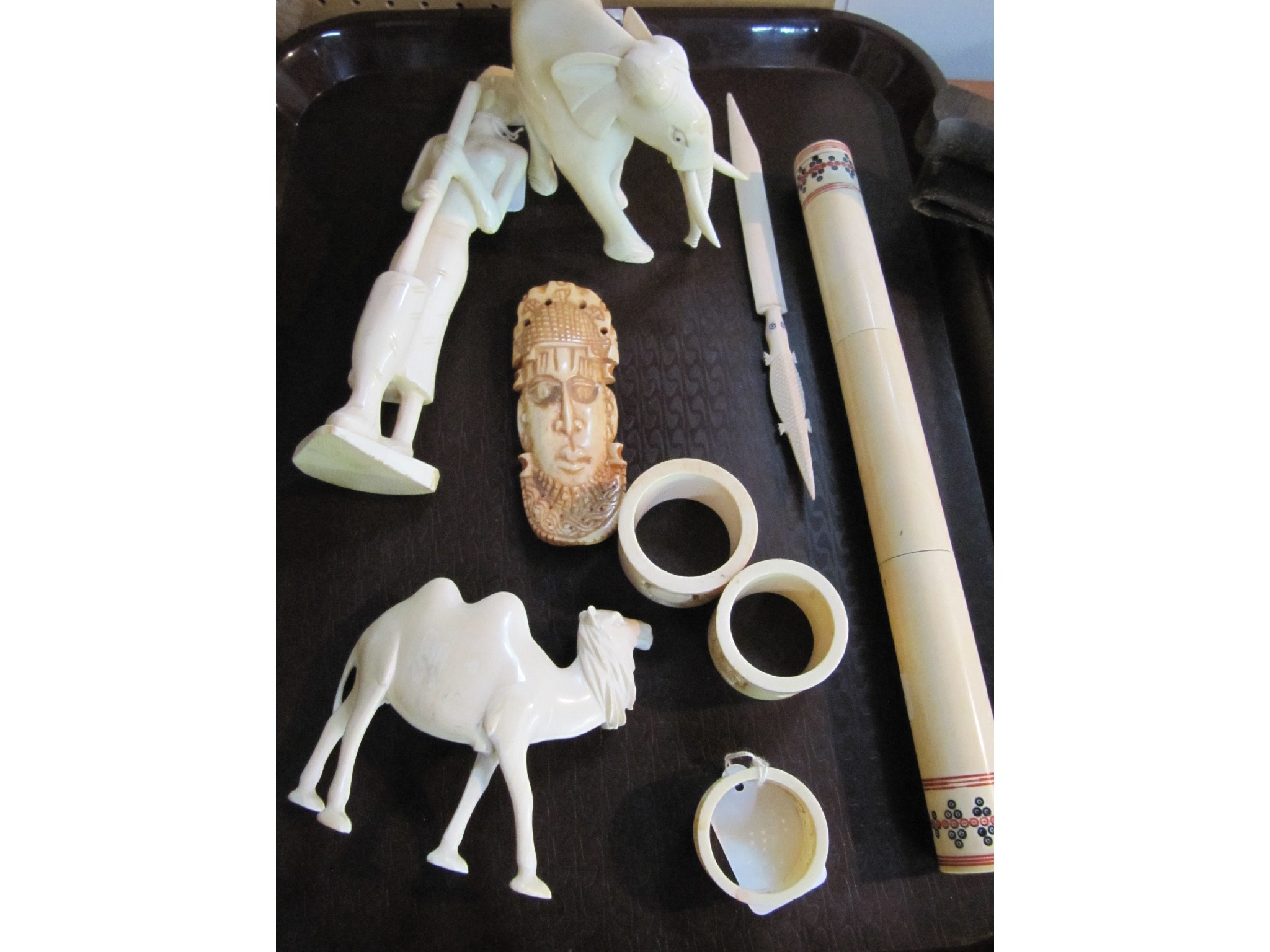 Appraisal: A lot comprising assorted bone and carved ivory figures napkin