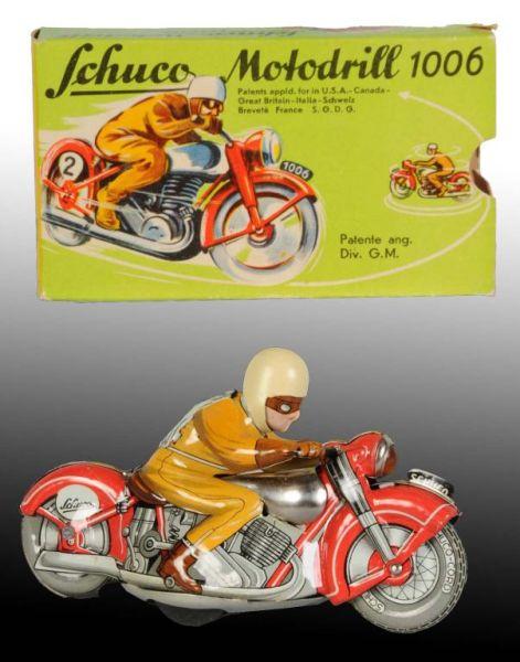 Appraisal: Tin Schuco Motodrill Motorcycle Wind-Up Toy Description German Includes original