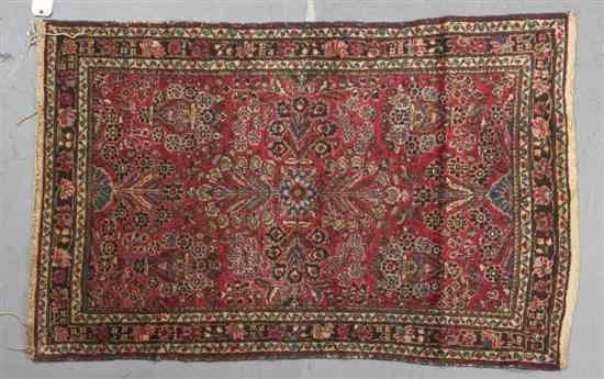 Appraisal: A Lilihan Wool Rug decorated with vases issuing flowers on