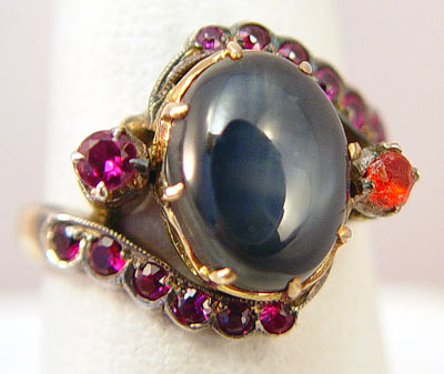 Appraisal: CT STAR SAPPHIRE AND RUBY RING K yellow gold ring